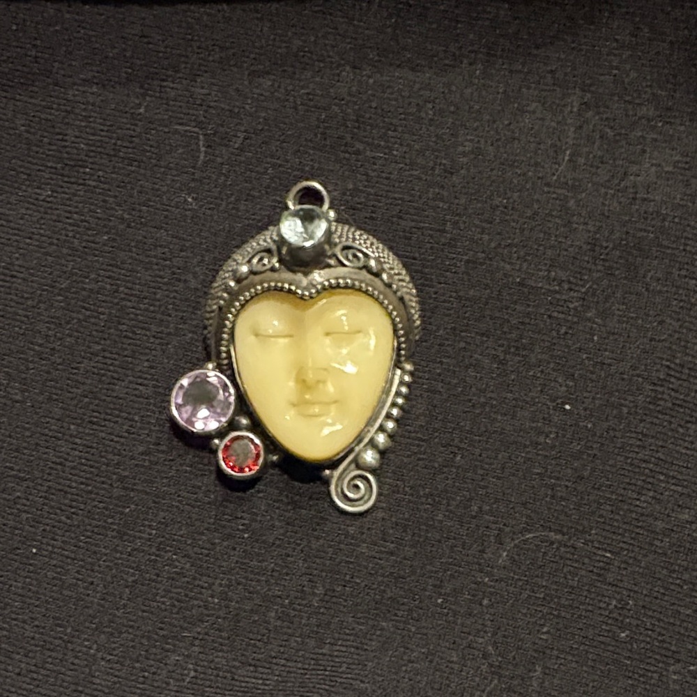 Sterling silver ivory face pendant Bali style with accent stones by Fire and Ice
